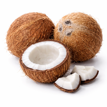 Coconuts with one split open on a white background
